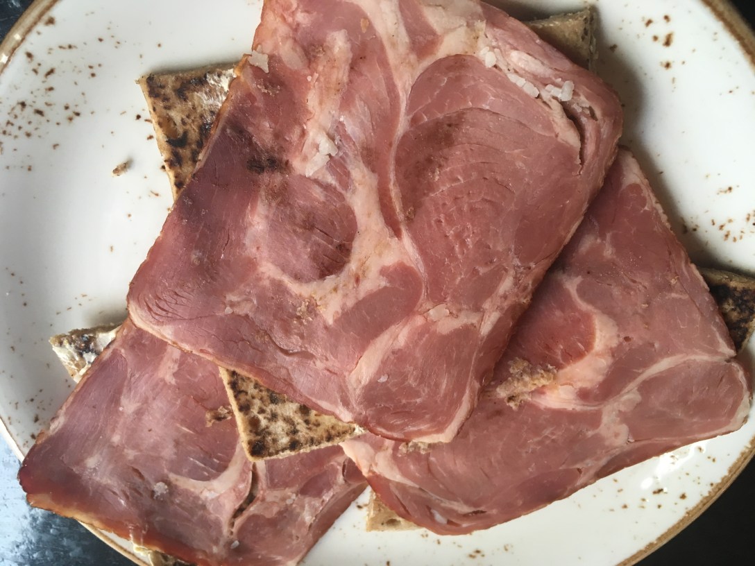 Smoked lamb on buttered  rye flatbread